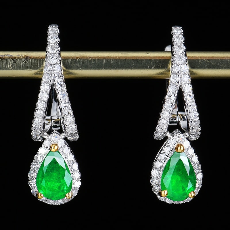 14k Gold 1.12 Ctw Vivid Green Natural Emerald & Diamond Earrings: Ref:230939199 // gold content:14k gold // main gemstone:emerald // shape:pear // carat weight:0. 7ct // color:vivid green // treatment:natural // // adjacent gemstone 2 : diamond // number of