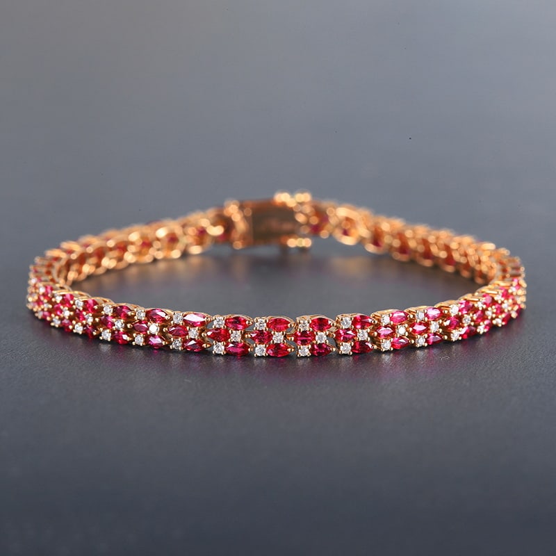 14k Gold 6.78 Ctw Natural Ruby & Diamond Bracelet: Ref:230939210 // gold content:14k gold // main gemstone:ruby // shape:marquise // carat weight:5. 85ct // color:red // treatment:natural // // adjacent gemstone 2 : diamond // number of stones:117 //