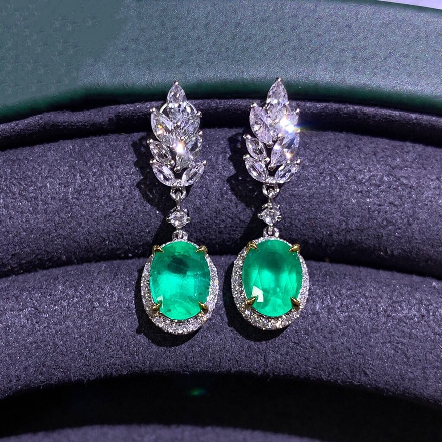 14k Gold 2.85 Ctw Vivid Green Natural Emerald & Diamond Earrings: Ref:230939224 // gold content:14k gold // main gemstone:emerald // shape:oval // carat weight:2. 63ct // color:vivid green // treatment:natural // // adjacent gemstone 2 : diamond // number of