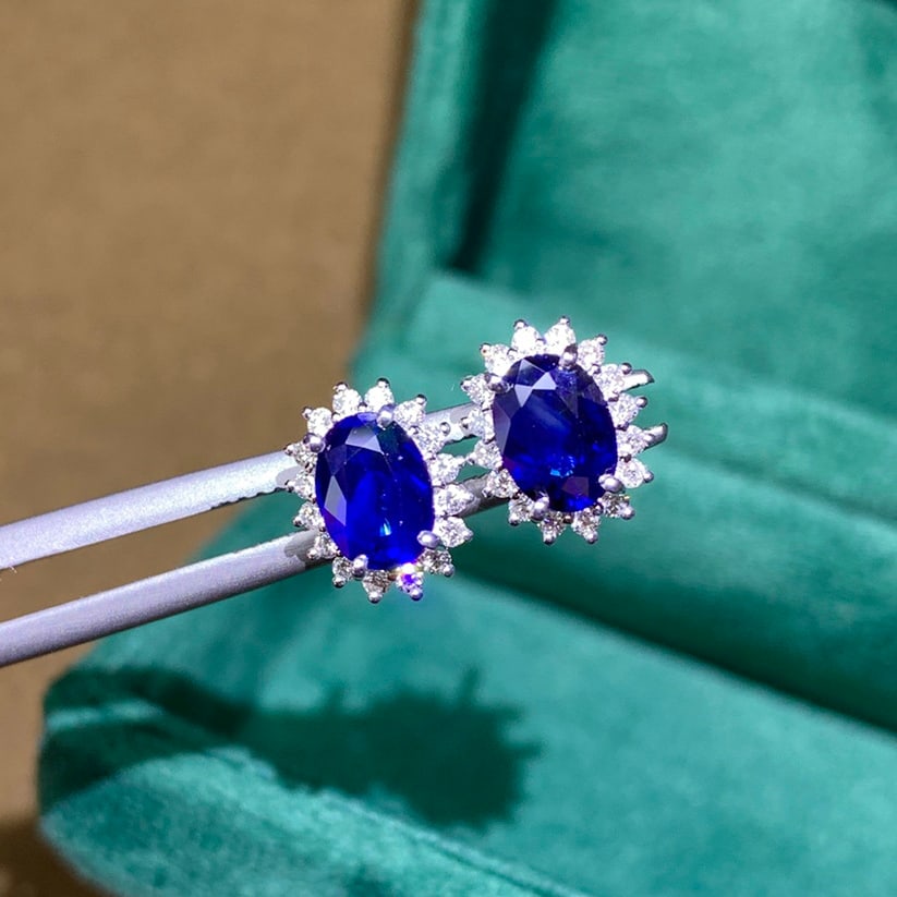 14k Gold 2.11 Ctw Vivid Blue Natural Sapphire & Diamond Earrings: Ref:230939245 // gold content:14k gold // main gemstone:sapphire // shape:oval // carat weight:1. 79ct // color:vivid blue // treatment:natural // // adjacent gemstone 2 : diamond // number of