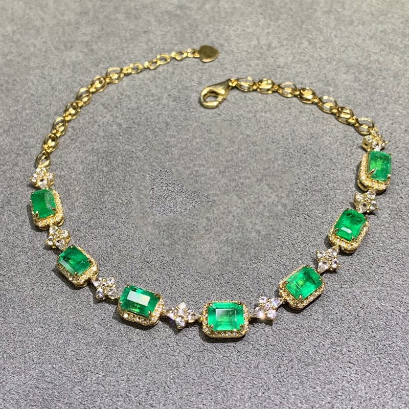 14k Gold 4.7 Ctw Vivid Green Natural Emerald & Diamond Bracelet: Ref:230939247 // gold content:14k gold // main gemstone:emerald // shape:octagonal // carat weight:4. 4ct // color:vivid green // treatment:natural // // adjacent gemstone 2 : diamond // number of sto