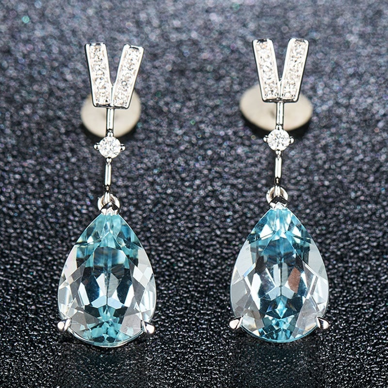 14k Gold 3.58 Ct Natural Aquamarine & Diamond Earrings: Ref:230939249 // gold content:14k gold // main gemstone:aquamarine // shape:pear // carat weight:3. 58ct // color:santa maria color // treatment:natural // // adjacent gemstone 2 : diamond // shape:ro