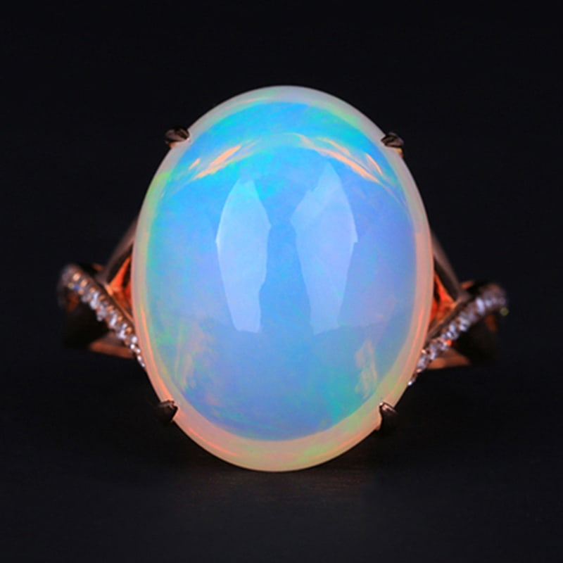 14k Gold 8.79 Ctw Natural Opal & Diamond Ring: Ref:230939251 // gold content:14k gold // ring size:7. 25us // // main gemstone:opal // shape:oval // carat weight:8. 7ct // color:white // treatment:natural // // adjacent gemstone 2 : diamond //
