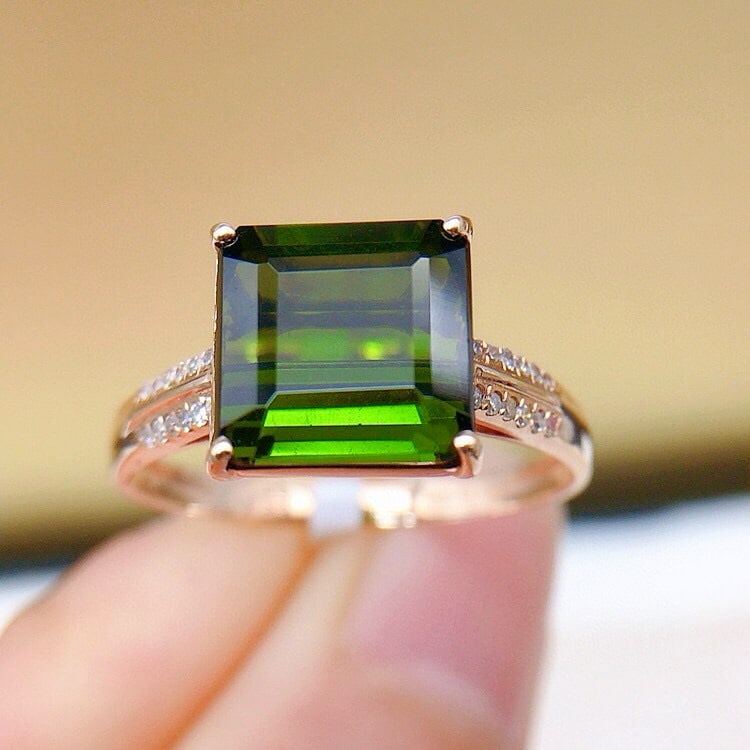14k Gold 3.3 Ct Natural Tourmaline & Diamond Ring: Ref:230940015 // gold content:14k gold // ring size:7. 25us // // main gemstone:tourmaline // shape:octagonal // carat weight:3. 3ct // color:green // treatment:natural // // adjacent gemstone 2 :