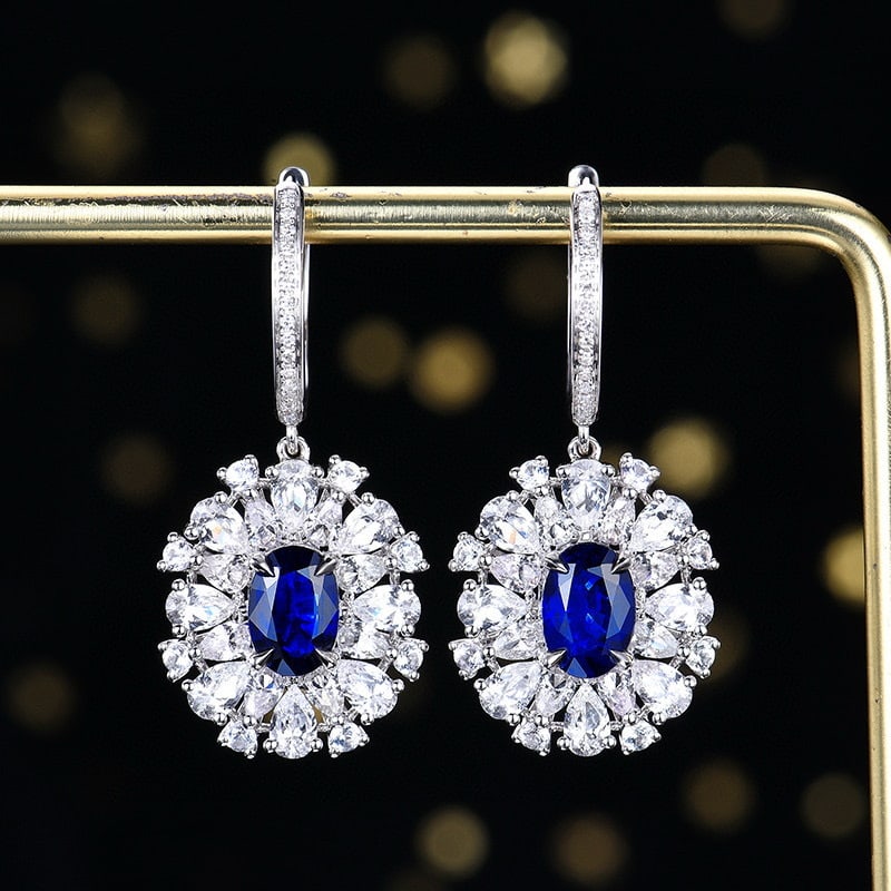 14k Gold 1.98 Ctw Natural Sapphire & Diamond Earrings: Ref:230940065 // gold content:14k gold // main gemstone:sapphire // shape:oval // carat weight:1. 9ct // color:royal blue // treatment:natural // // adjacent gemstone 2 : diamond // number of