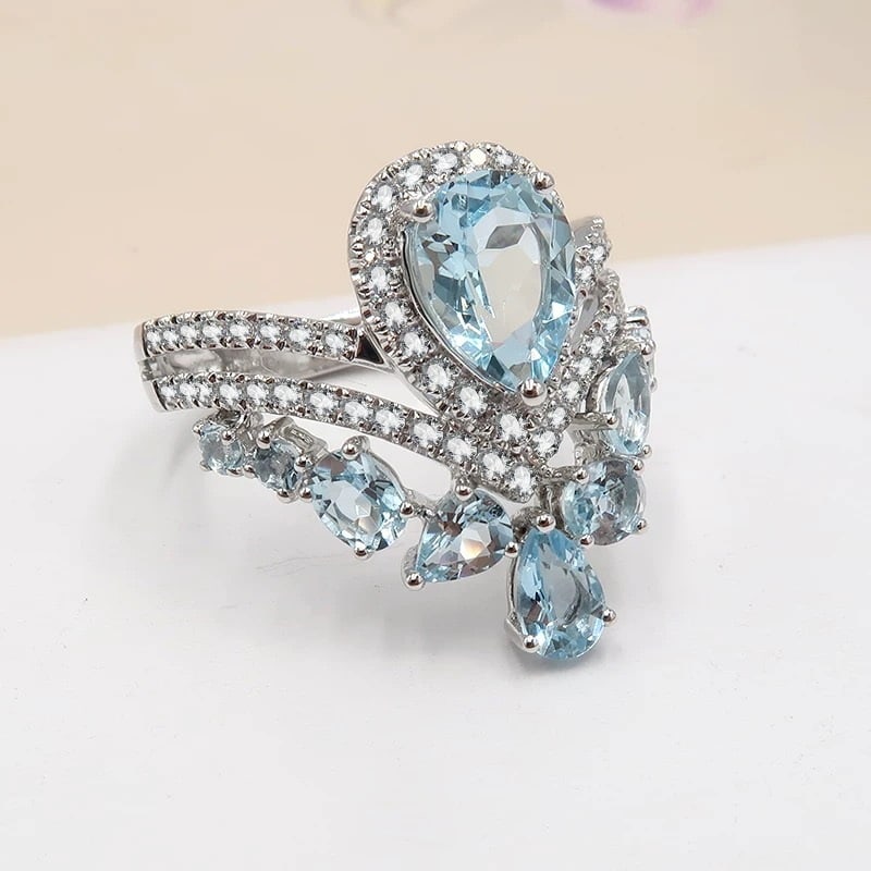 14k Gold 1.92 Ctw Natural Aquamarine & Aquamarine Ring: Ref:230940071 // gold content:14k gold // ring size:7. 25us // // main gemstone:aquamarine // shape:pear // carat weight:1. 20ct // color:blue // treatment:natural // // adjacent gemstone 2 :