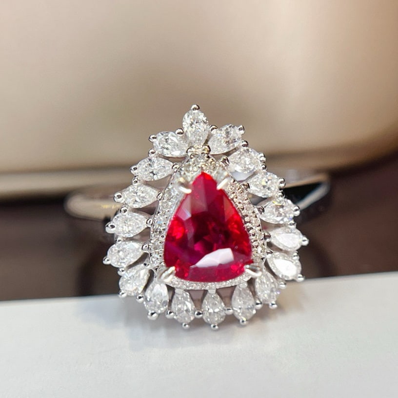 14k Gold 1.25 Ct Natural Ruby & Diamond Ring: Ref:230940074 // gold content:14k gold // ring size:7. 25us // // main gemstone:ruby // shape:pear // carat weight:1. 25ct // color:pigeonblood red // treatment:natural // // adjacent gemstone 2 : dia