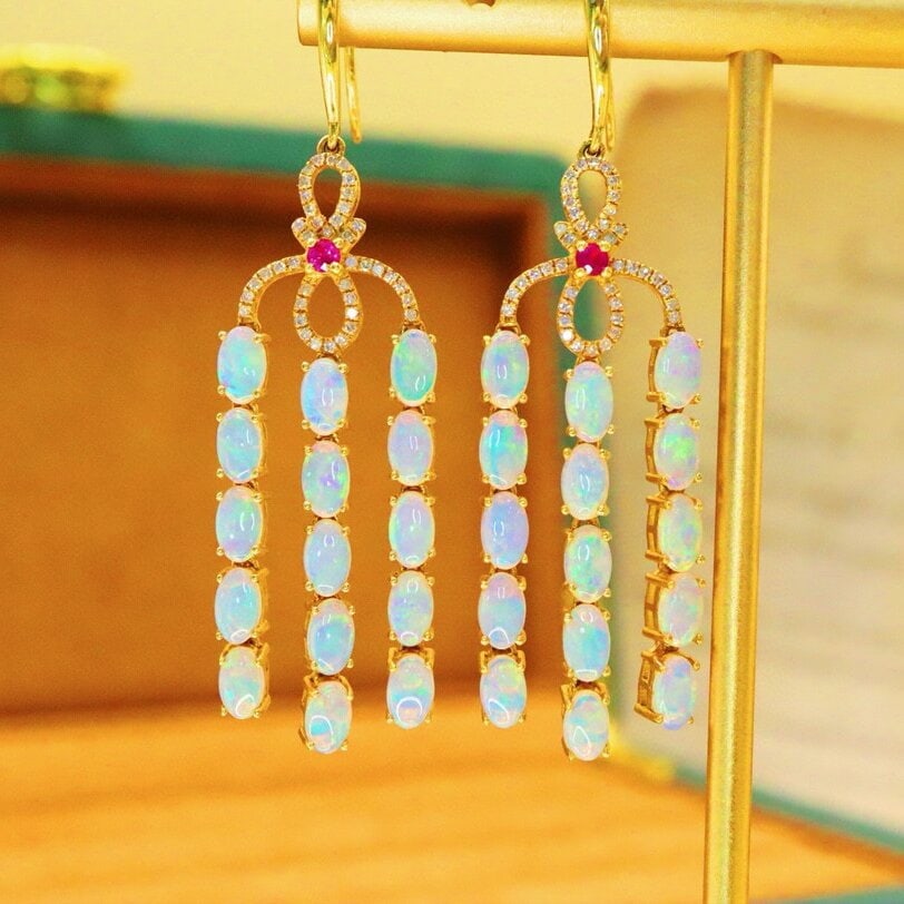 14k Gold 4.40 Ctw Natural Opal & Diamond Earrings: Ref:230940076 // gold content:14k gold // main gemstone:opal // shape:oval // carat weight:4. 16ct // color:white // treatment:natural // // adjacent gemstone 2 : diamond // number of stones:82 //