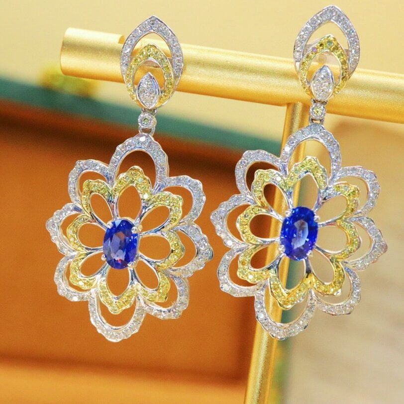 14k Gold 2.60 Ctw Natural Sapphire & Diamond Earrings: Ref:230940104 // gold content:14k gold // main gemstone:sapphire // shape:oval // carat weight:1. 43ct // color:cornflower blue // treatment:natural // // adjacent gemstone 2 : diamond // number of