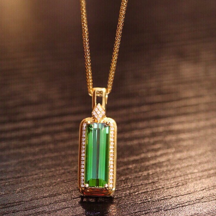 14k Gold 4.48 Ct Natural Tourmaline & Diamond Pendant( Without Chain ): Ref:230940117 // gold content:14k gold // main gemstone:tourmaline // shape:octagonal // carat weight:4. 48ct // color:green // treatment:natural // // adjacent gemstone 2 : diamond // number of