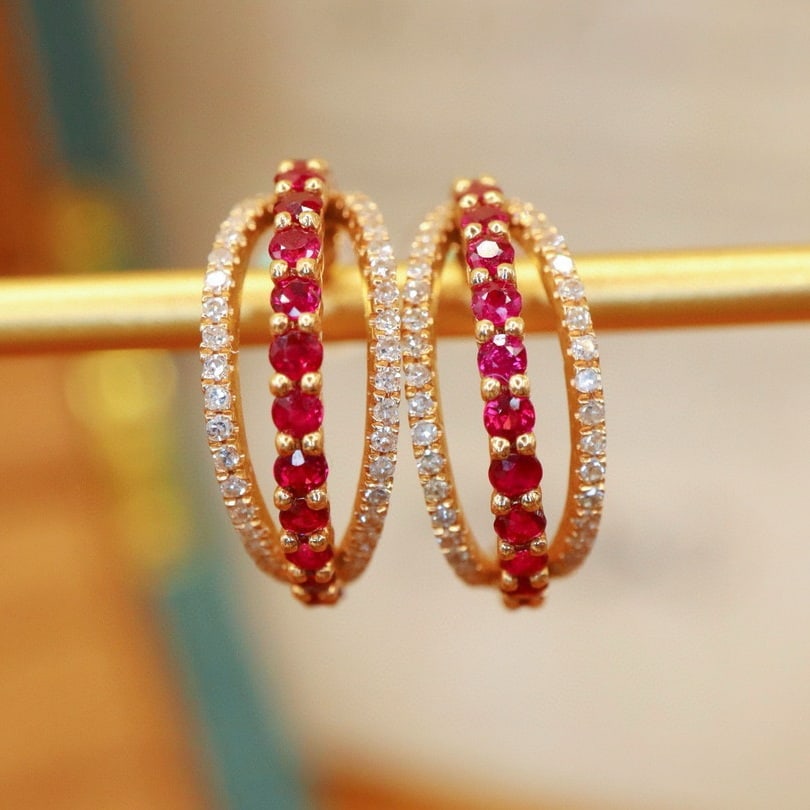 14k Gold 0.91 Ctw Natural Ruby & Diamond Earrings: Ref:230940134 // gold content:14k gold // main gemstone:ruby // shape:round // carat weight:0. 65ct // color:red // treatment:natural // cut grade:g // // adjacent gemstone 2 : diamond // number of