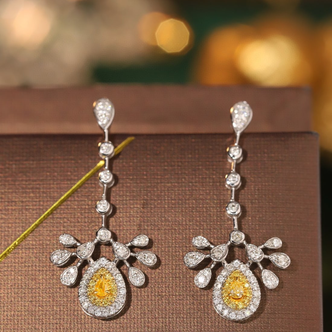 14k Gold 0.8 Ct Natural Color Diamond Earrings: Ref:230940143 // gold content:14k gold // main gemstone:diamond // shape:multiply // carat weight:0. 8ct // clarity grade:vs-si // color:color // treatment:natural // Condition: NewLow Estimate: