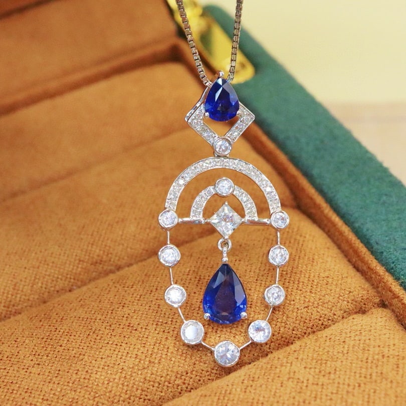 14k Gold 1.53 Ctw Vivid Blue Natural Sapphire & Diamond Pendant( Without Chain ): Ref:230940146 // gold content:14k gold // main gemstone:sapphire // shape:pear // carat weight:1. 43ct // color:vivid blue // treatment:natural // // adjacent gemstone 2 : diamond // number of