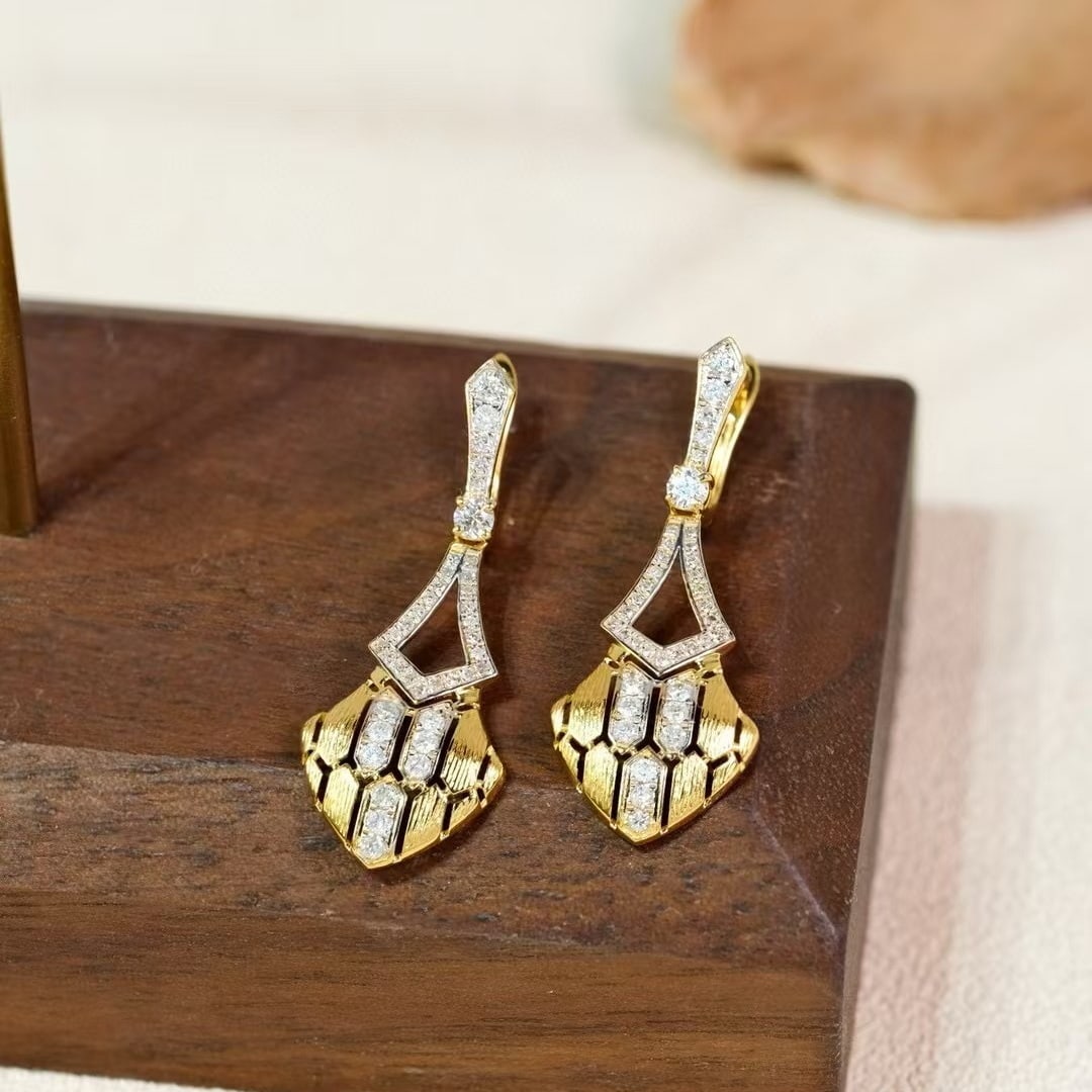 14k Gold 0.7 Ct Natural H Diamond Earrings: Ref:230940152 // gold content:14k gold // main gemstone:diamond // shape:round // carat weight:0. 7ct // clarity grade:vs-si // color:h // treatment:natural // cut grade:g // Condition: NewLow