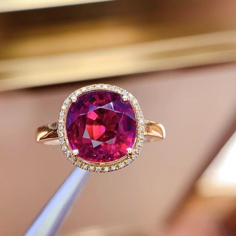 14k Gold 4.3 Ct Natural Tourmaline & Diamond Ring: Ref:230940159 // gold content:14k gold // ring size:7. 25us // // main gemstone:tourmaline // shape:cushion // carat weight:4. 3ct // color:red // treatment:natural // // adjacent gemstone 2 :
