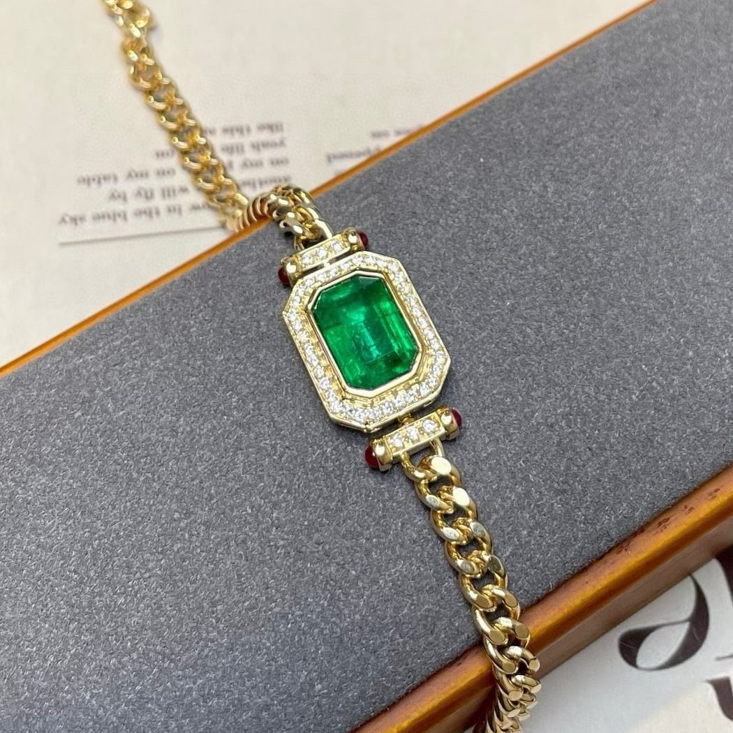 14k Gold 3.26 Ctw Vivid Green Natural Emerald & Diamond Bracelet: Ref:230940243 // gold content:14k gold // main gemstone:emerald // shape:octagonal // carat weight:2. 95ct // color:vivid green // treatment:natural // // adjacent gemstone 2 : diamond //
