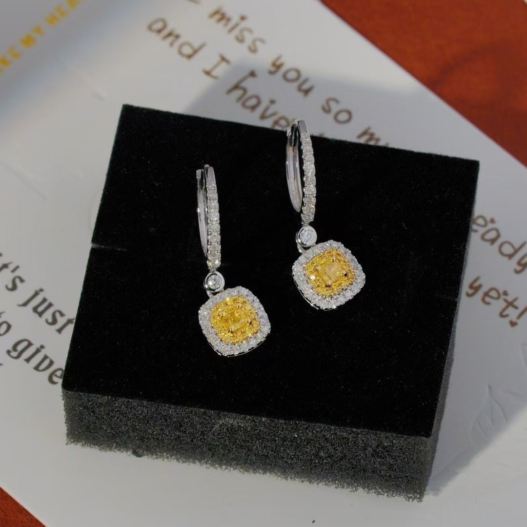 14k Gold 0.6 Ct Natural Color Diamond Earrings: Ref:230940248 // gold content:14k gold // main gemstone:diamond // shape:multiply // carat weight:0. 6ct // clarity grade:vs-si // color:color // treatment:natural // Condition: NewLow Estimate: