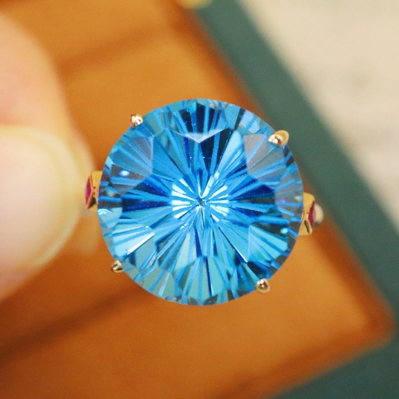 14k Gold 11.90 Ctw Natural Topaz & Diamond Ring: Ref:230940265 // gold content:14k gold // ring size:7. 25us // // main gemstone:topaz // shape:round // carat weight:11. 88ct // color:blue // treatment:natural // cut grade:g // // adjacent gemstone