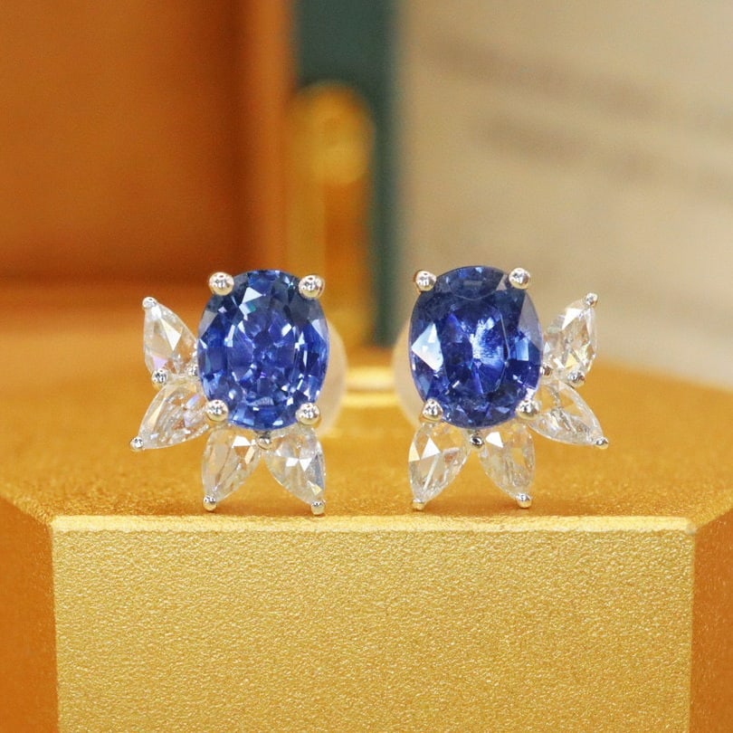 14k Gold 1.21 Ctw Natural Sapphire & Diamond Earrings: Ref:230940272 // gold content:14k gold // main gemstone:sapphire // shape:oval // carat weight:1. 06ct // color:cornflower blue // treatment:natural // // adjacent gemstone 2 : diamond // number of
