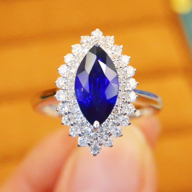 14k Gold 1.99 Ctw Natural Sapphire & Diamond Ring: Ref:230940285 // gold content:14k gold // ring size:7. 25us // // main gemstone:sapphire // shape:marquise // carat weight:1. 58ct // color:royal blue // treatment:natural // // adjacent gemstone 2 :