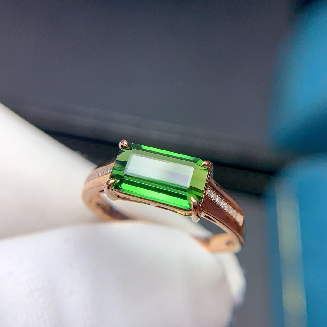 14k Gold 1.9 Ct Natural Tourmaline & Diamond Ring: Ref:230940319 // gold content:14k gold // ring size:7. 25us // // main gemstone:tourmaline // shape:octagonal // carat weight:1. 9ct // color:green // treatment:natural // // adjacent gemstone 2 :