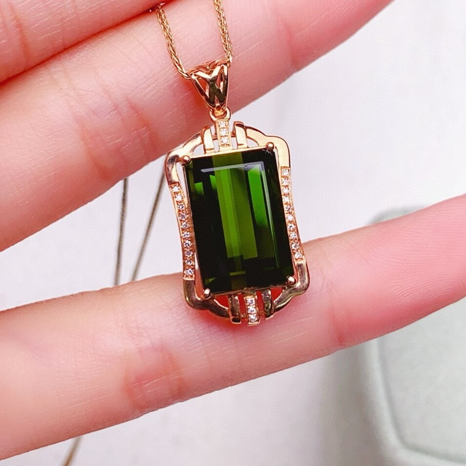 14k Gold 7.93 Ctw Natural Tourmaline & Diamond Pendant( Without Chain ): Ref:230940365 // gold content:14k gold // main gemstone:tourmaline // shape:octagonal // carat weight:7. 85ct // color:green // treatment:natural // // adjacent gemstone 2 : diamond // number of