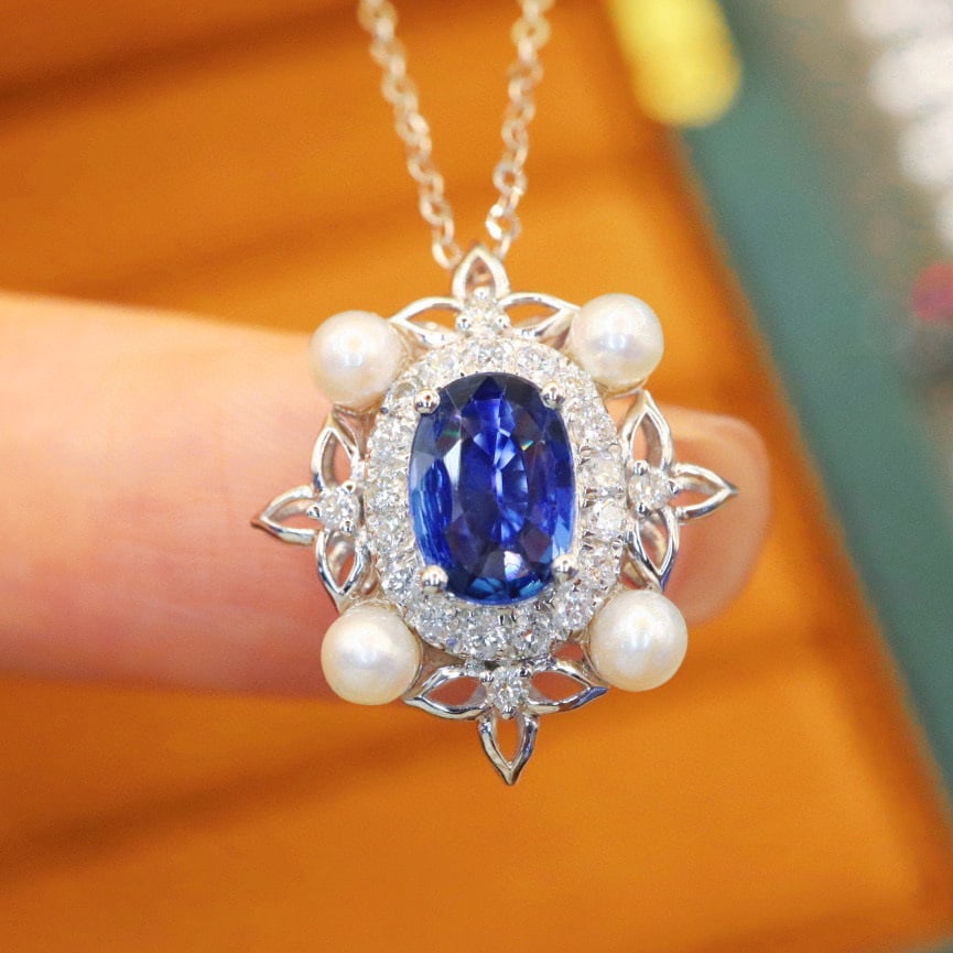 14k Gold 1.09 Ctw Natural Sapphire & Diamond Necklace: Ref:230940386 // gold content:14k gold // main gemstone:sapphire // shape:oval // carat weight:0. 88ct // color:blue // treatment:natural // // adjacent gemstone 2 : diamond // number of stones:21