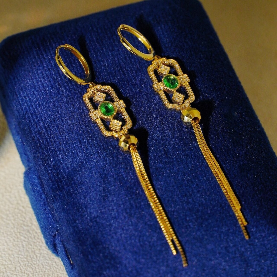 14k Gold 0.76 Ct Vivid Green Natural Emerald & Diamond Earrings: Ref:230940398 // gold content:14k gold // main gemstone:emerald & diamond // shape:oval & round // carat weight:0. 76ct // color:vivid green & h // treatment:natural // Condition: NewLow Estimate: