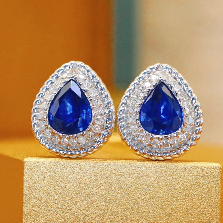 14k Gold 1.25 Ctw Natural Sapphire & Diamond Earrings: Ref:230940406 // gold content:14k gold // main gemstone:sapphire // shape:pear // carat weight:1. 13ct // color:royal blue // treatment:natural // // adjacent gemstone 2 : diamond // number of