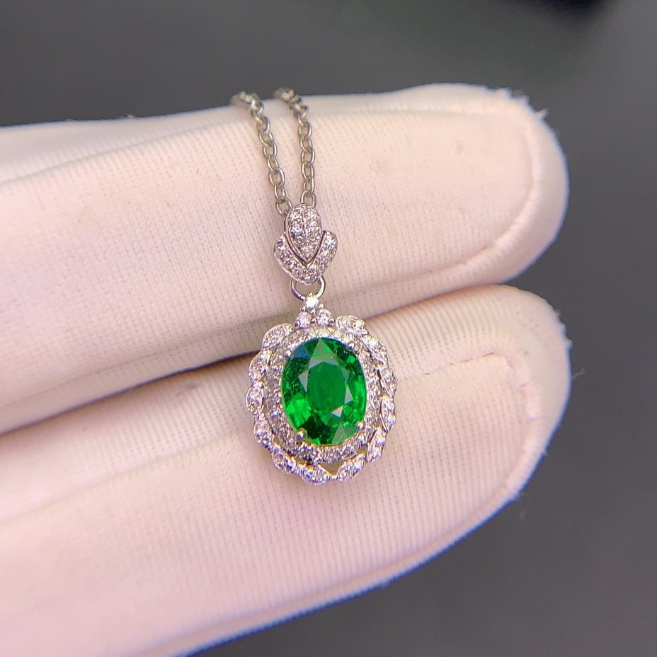 14k Gold 1.09 Ct Vivid Green Natural Tsavorite & Diamond Pendant( Without Chain ): Ref:230940409 // gold content:14k gold // main gemstone:tsavorite // shape:oval // carat weight:1. 09ct // color:vivid green // treatment:natural // // adjacent gemstone 2 : diamond // shape:round