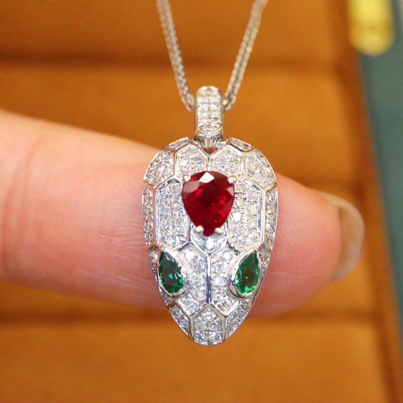 14k Gold 0.62 Ctw Vivid Red Natural Ruby & Diamond Pendant( Without Chain ): Ref:230940441 // gold content:14k gold // main gemstone:ruby // shape:pear // carat weight:0. 36ct // color:vivid red // treatment:natural // // adjacent gemstone 2 : diamond // number of stones:86