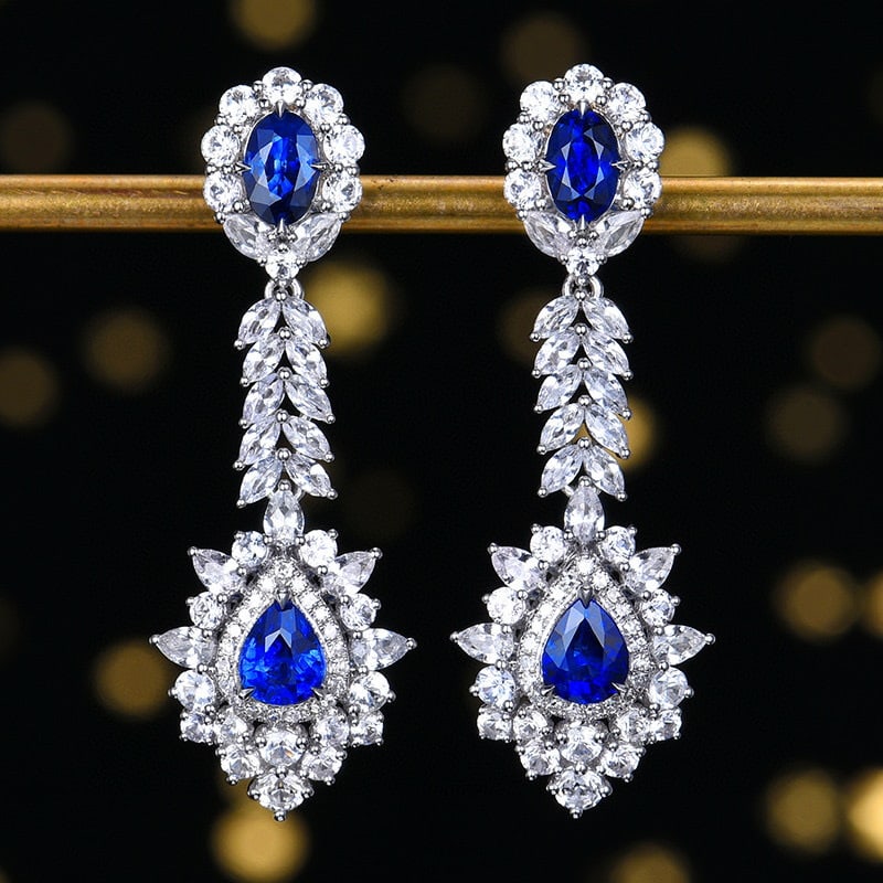 14k Gold 2.28 Ctw Vivid Blue Natural Sapphire & Diamond Earrings: Ref:230937014 // gold content:14k gold // main gemstone:sapphire // shape:multiply // carat weight:2. 16ct // color:vivid blue // treatment:natural // // adjacent gemstone 2 : diamond // number of sto