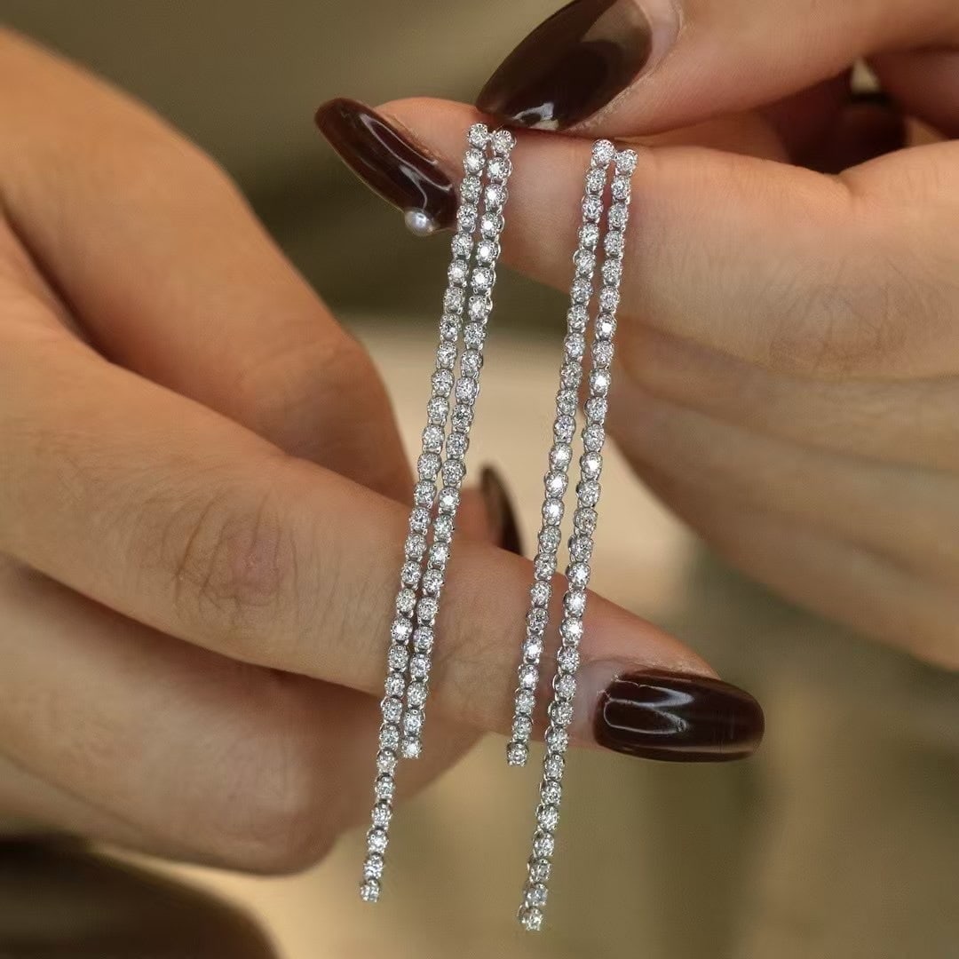 14k Gold 1.1 Ct Natural H Diamond Earrings: Ref:230937037 // gold content:14k gold // main gemstone:diamond // shape:round // carat weight:1. 1ct // clarity grade:vs-si // color:h // treatment:natural // cut grade:g // Condition: NewLow