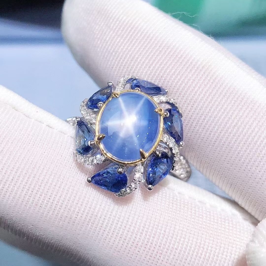 14k Gold 4.69 Ctw Natural Star Sapphire & Diamond Ring: Ref:230937116 // gold content:14k gold // ring size:7. 25us // // main gemstone:star sapphire // shape:oval // carat weight:4. 38ct // color:blue // treatment:natural // // adjacent gemstone 2 :