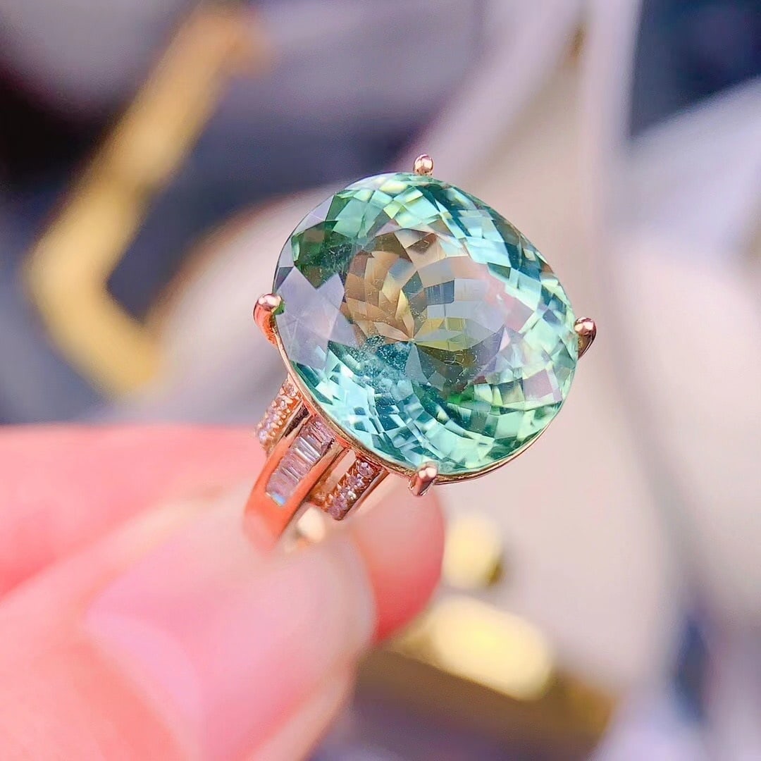 14k Gold 11 Ct Natural Tourmaline & Diamond Ring: Ref:230937123 // gold content:14k gold // ring size:7. 25us // // main gemstone:tourmaline // shape:oval // carat weight:11ct // color:green // treatment:natural // // adjacent gemstone 2 : diamond //