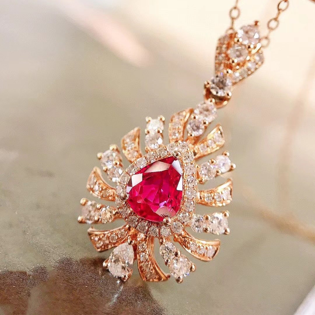 14k Gold 1.02 Ctw Natural Ruby & Diamond Pendant( Without Chain ): Ref:230937137 // gold content:14k gold // main gemstone:ruby // shape:pear // carat weight:0. 51ct // color:red // treatment:natural // // adjacent gemstone 2 : diamond // shape:multiply // carat