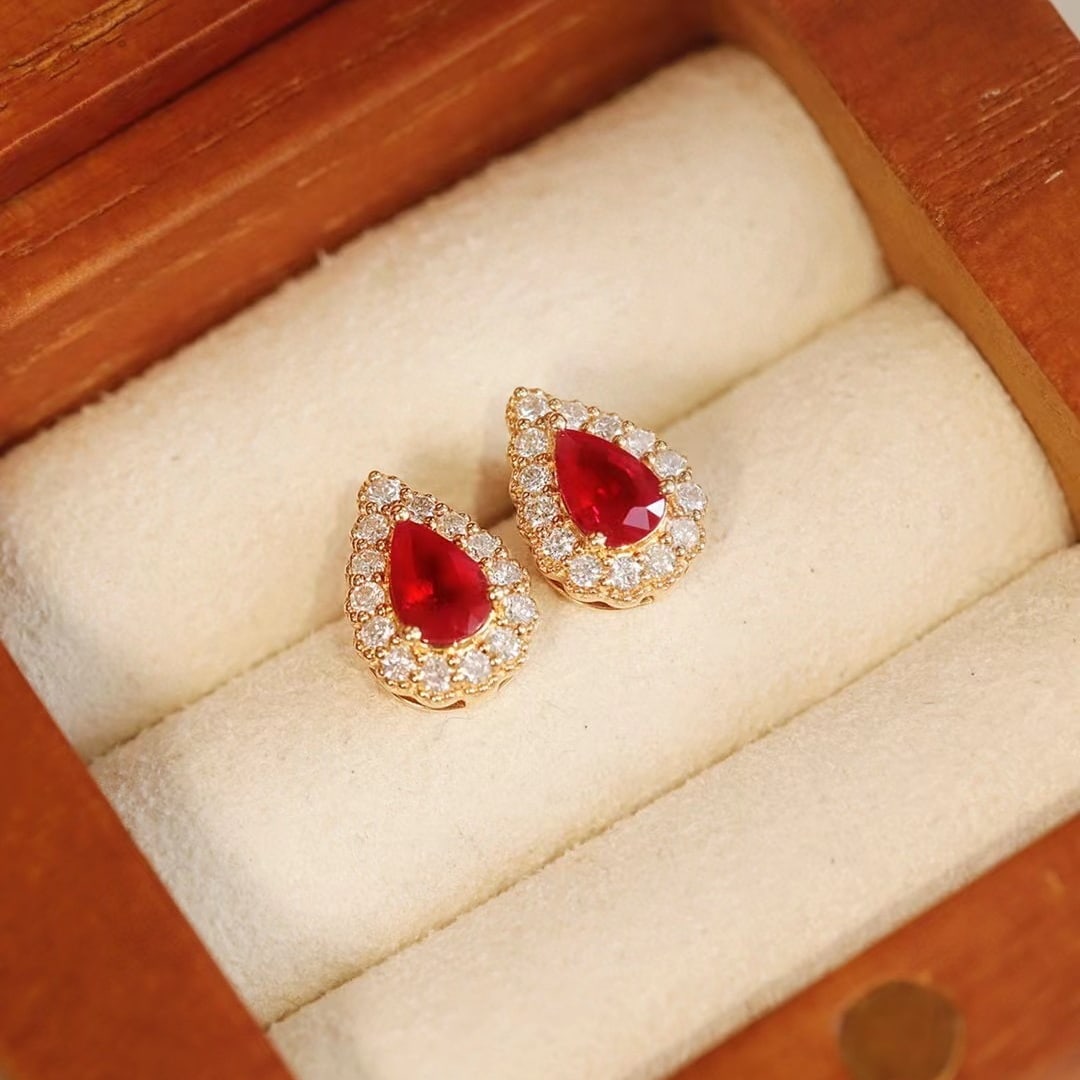 14k Gold 1.24 Ctw Vivid Red Natural Ruby & Diamond Earrings: Ref:230937140 // gold content:14k gold // main gemstone:ruby // shape:pear // carat weight:0. 91ct // color:vivid red // treatment:natural // // adjacent gemstone 2 : diamond // shape:round //
