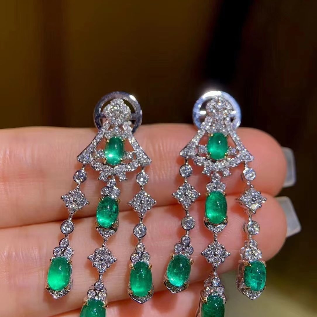 14k Gold 4.97 Ctw Natural Emerald & Diamond Earrings: Ref:230937147 // gold content:14k gold // main gemstone:emerald // shape:oval // carat weight:3. 9ct // color:green // treatment:natural // // adjacent gemstone 2 : diamond // shape:round // carat