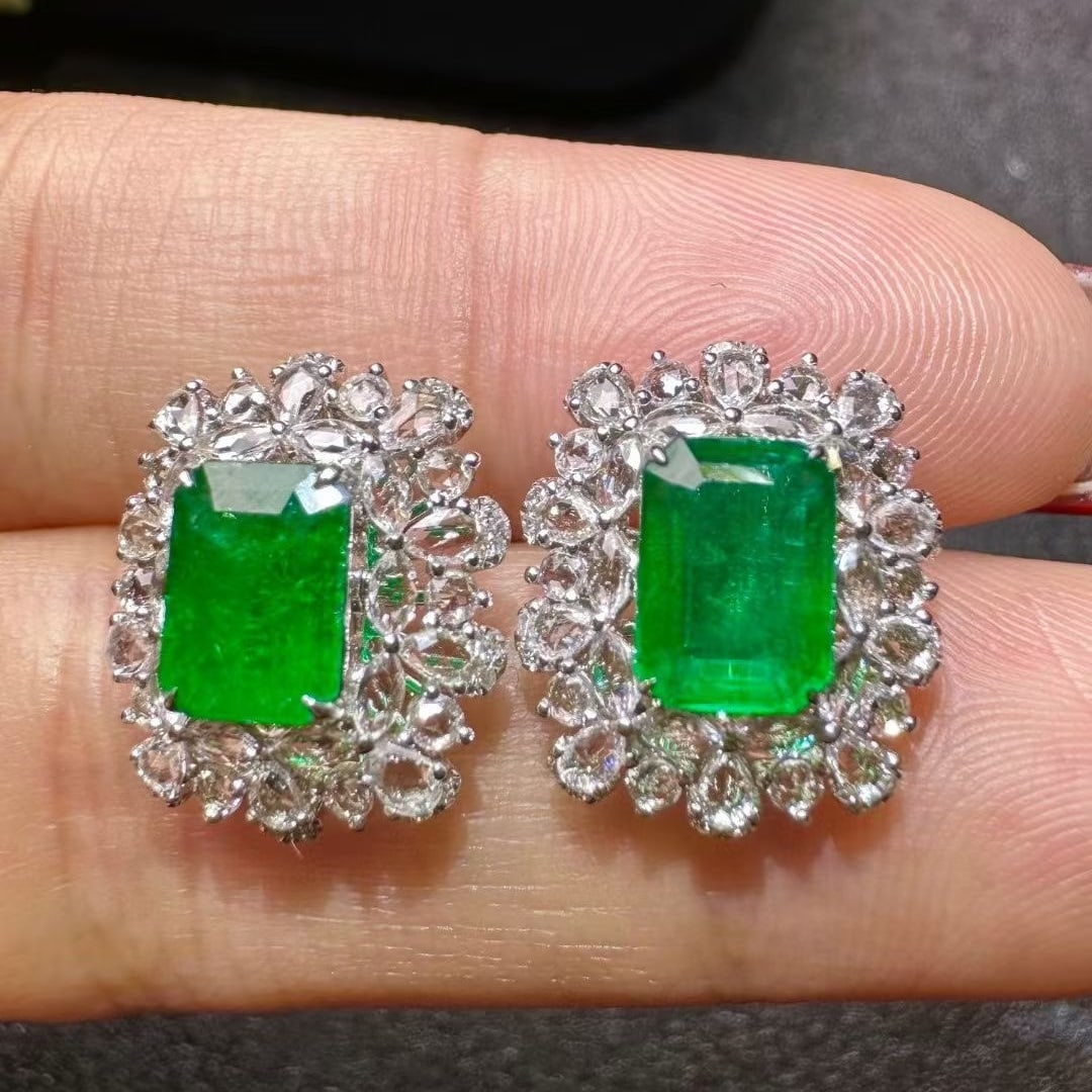 14k Gold 1.95 Ct Vivid Green Natural Emerald Earrings: Ref:230937150 // gold content:14k gold // main gemstone:emerald // shape:octagonal // carat weight:1. 95ct // color:vivid green // treatment:natural // Condition: NewLow Estimate: 2000.00High