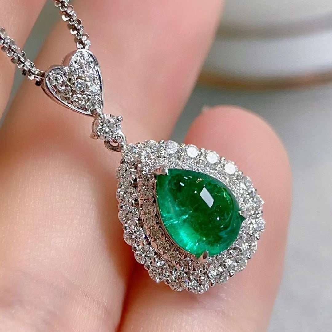 14k Gold 2.11 Ctw Vivid Green Natural Emerald & Diamond Pendant( Without Chain ): Ref:230937165 // gold content:14k gold // main gemstone:emerald // shape:pear // carat weight:1. 50ct // color:vivid green // treatment:natural // // adjacent gemstone 2 : diamond // shape:round //