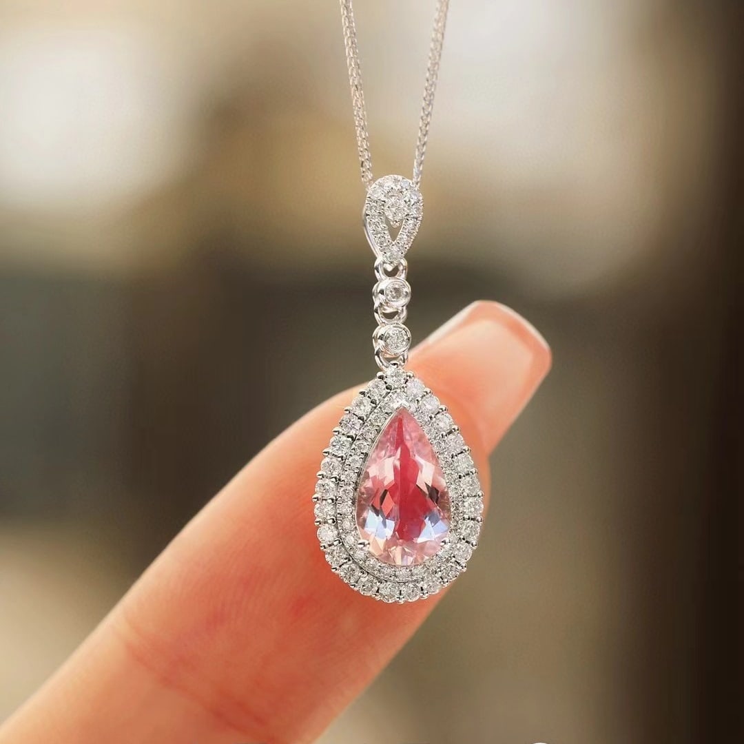 14k Gold 1.49 Ctw Natural Morganite & Diamond Necklace: Ref:230937192 // gold content:14k gold // main gemstone:morganite // shape:pear // carat weight:1. 11ct // color:pink // treatment:natural // // adjacent gemstone 2 : diamond // shape:round //