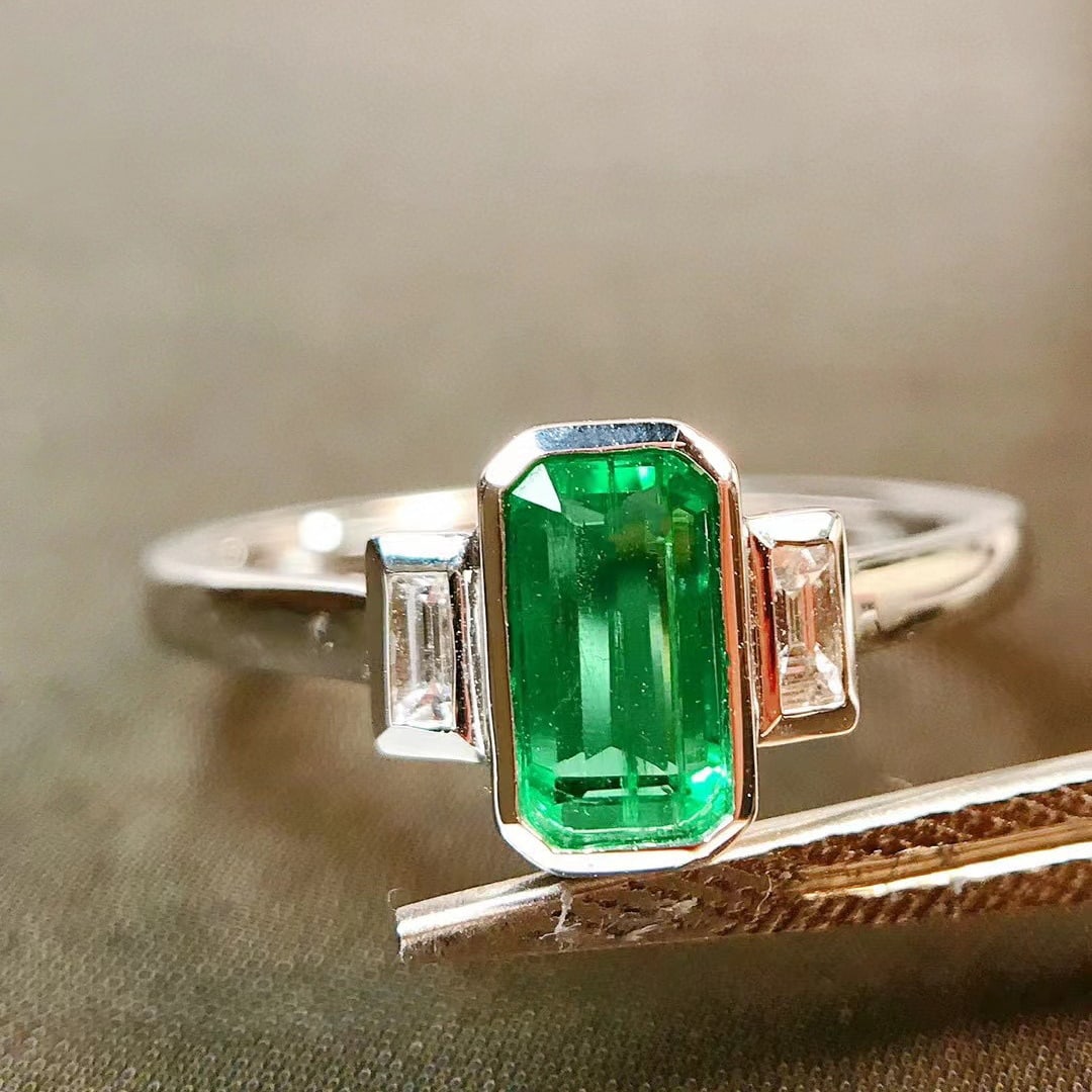 14k Gold 0.64 Ctw Intense Green Natural Emerald & Diamond Ring: Ref:230937206 // gold content:14k gold // ring size:7. 25us // // main gemstone:emerald // shape:octagonal // carat weight:0. 55ct // color:intense green // treatment:natural // // adjacent gemstone 2