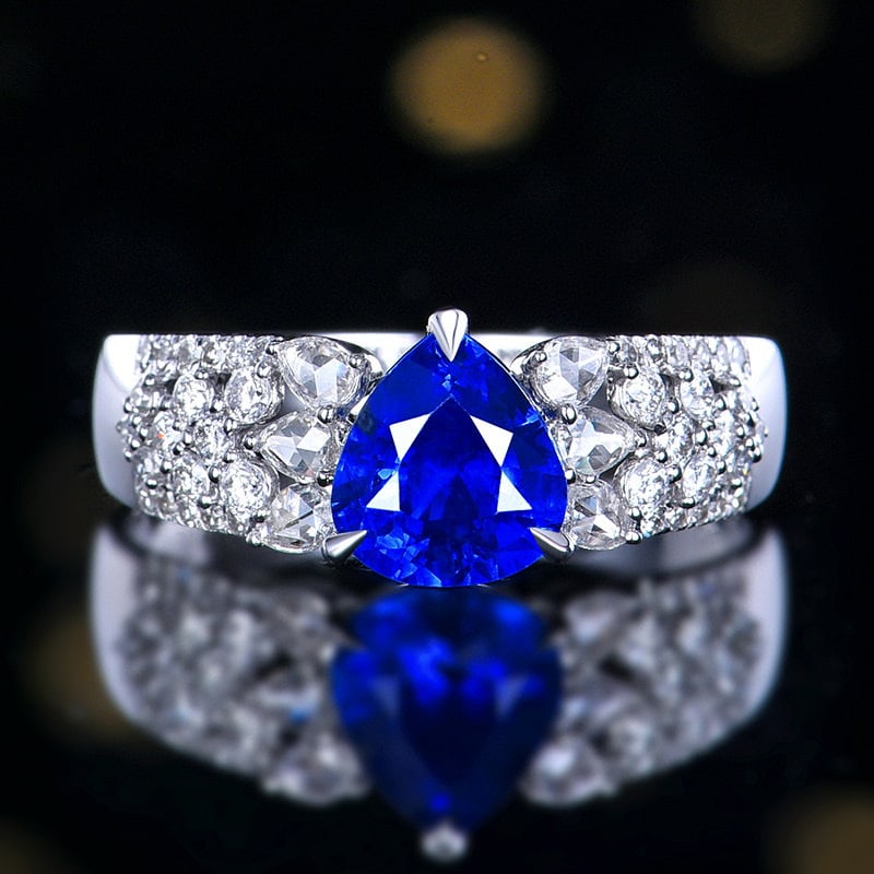 14k Gold 1.66 Ctw Natural Sapphire & Diamond Ring: Ref:230937252 // gold content:14k gold // ring size:7. 25us // // main gemstone:sapphire // shape:pear // carat weight:1. 28ct // color:royal blue // treatment:natural // // adjacent gemstone 2 :