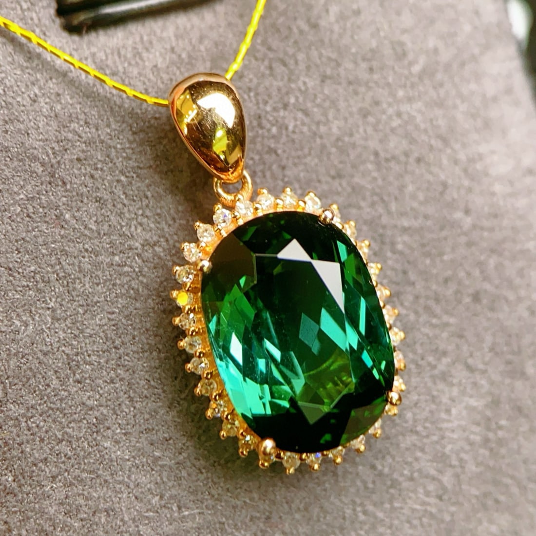 14k Gold 5.26 Ctw Natural Tourmaline & Diamond Pendant( Without Chain ): Ref:230937257 // gold content:14k gold // main gemstone:tourmaline // shape:oval // carat weight:5. 1ct // color:green // treatment:natural // // adjacent gemstone 2 : diamond // number of