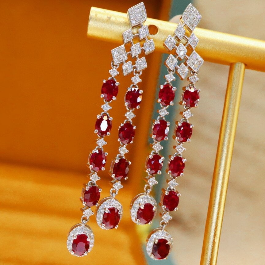 14k Gold 4.33 Ctw Natural Ruby & Diamond Earrings: Ref:230938009 // gold content:14k gold // main gemstone:ruby // shape:oval // carat weight:3. 8ct // color:pigeonblood red // treatment:natural // // adjacent gemstone 2 : diamond // number of
