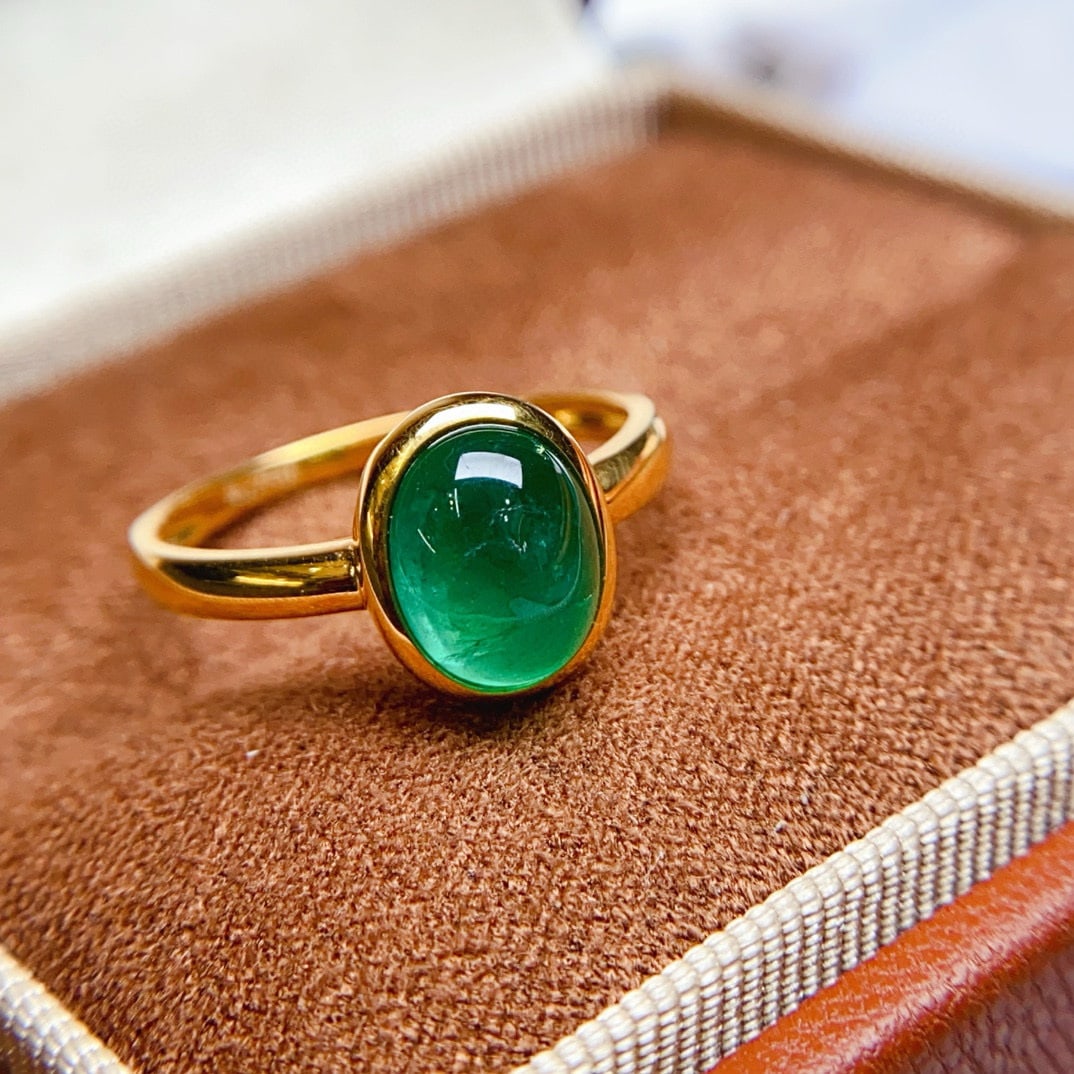 14k Gold 1.9 Ct Vivid Green Natural Emerald Ring: Ref:230938017 // gold content:14k gold // ring size:7. 25us // // main gemstone:emerald // shape:oval // carat weight:1. 9ct // color:vivid green // treatment:natural // Condition: NewLow Estimate: