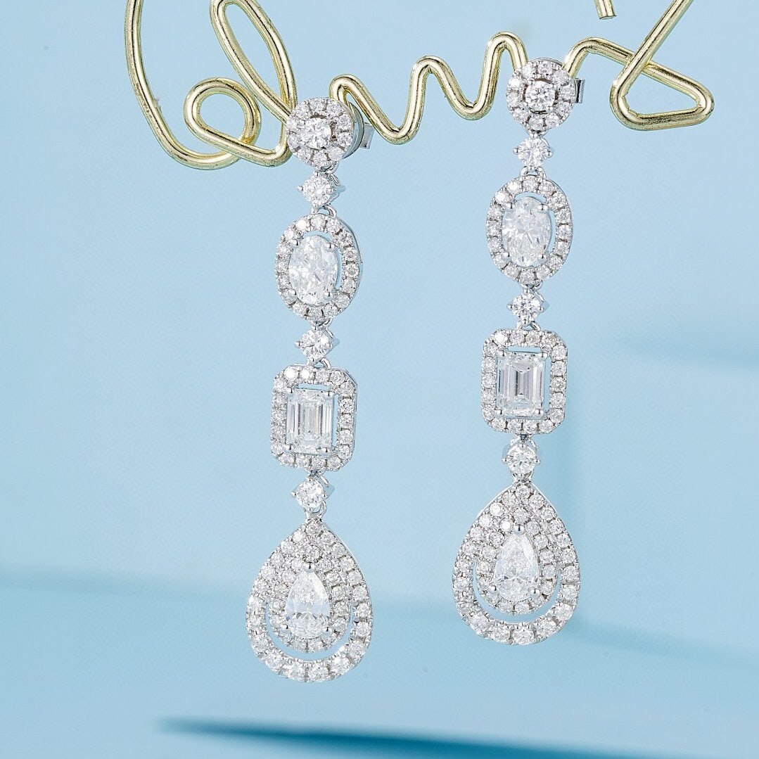 14k Gold 2.46 Ct Natural H Diamond Earrings: Ref:230938030 // gold content:14k gold // main gemstone:diamond // shape:multiply // carat weight:2. 46ct // clarity grade:vs-si // color:h // treatment:natural // Condition: NewLow Estimate: