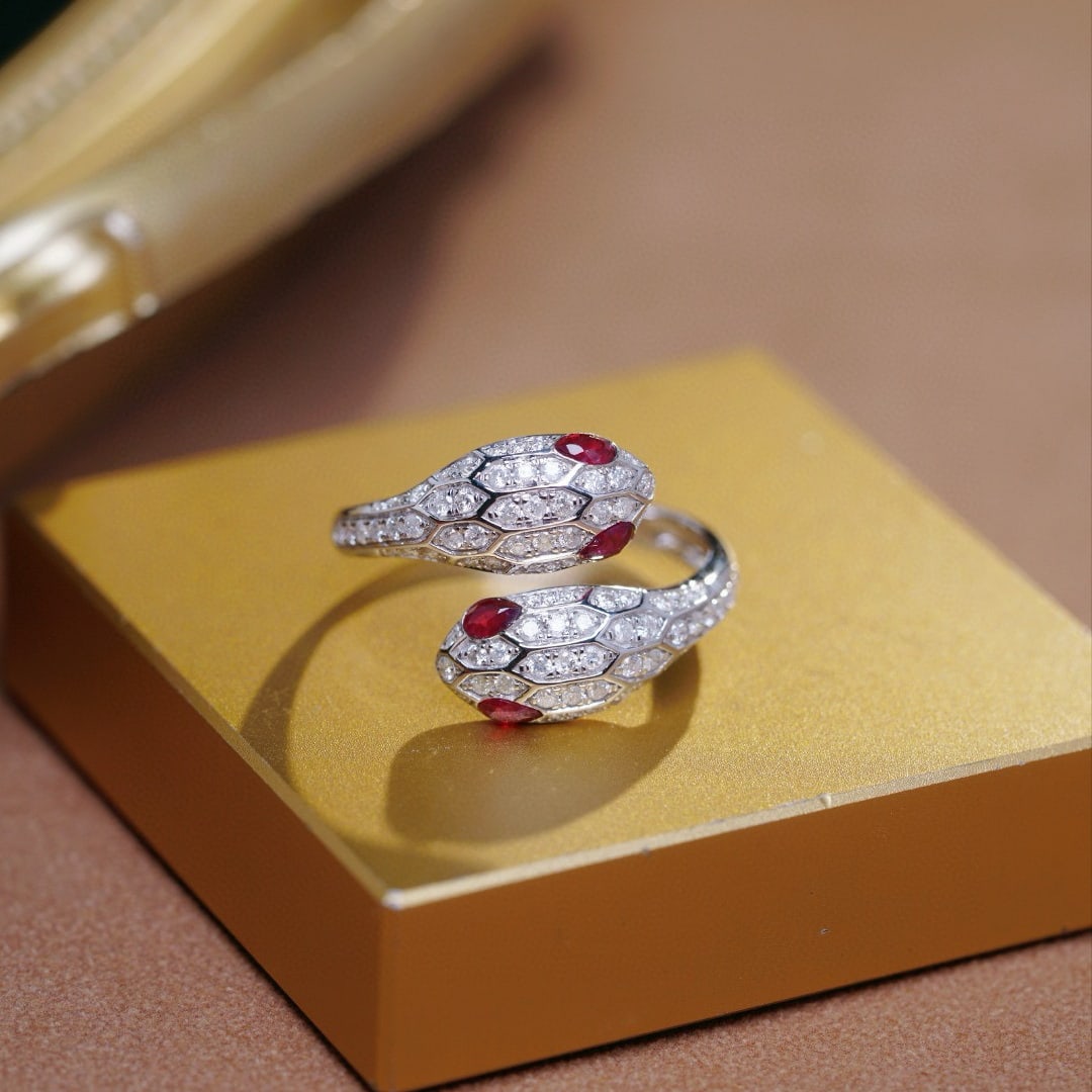 14k Gold 0.80 Ctw Vivid Red Natural Ruby & Diamond Ring: Ref:230938069 // gold content:14k gold // ring size:7. 25us // // main gemstone:ruby // shape:pear // carat weight:0. 32ct // color:vivid red // treatment:natural // // adjacent gemstone 2 :