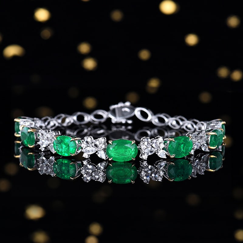 14k Gold 9.83 Ctw Vivid Green Natural Emerald & Sapphire Bracelet: Ref:230938079 // gold content:14k gold // main gemstone:emerald // shape:oval // carat weight:7. 85ct // color:vivid green // treatment:natural // // adjacent gemstone 2 : sapphire // number of stones