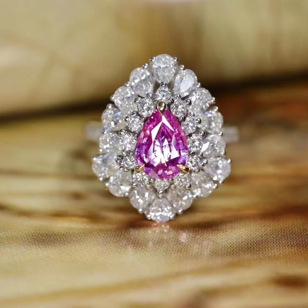 14k Gold 2.80 Ctw Natural Padparadscha Sapphire & Diamond Ring: Ref:230938110 // gold content:14k gold // ring size:7. 25us // // main gemstone:padparadscha sapphire // shape:pear // carat weight:1. 04ct // color:orangish pink // treatment:natural // //